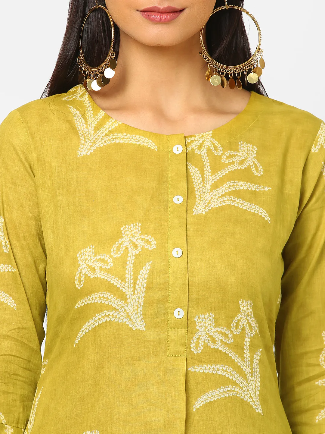 A line cotton printed kurta with placket detailing paired with printed bottom