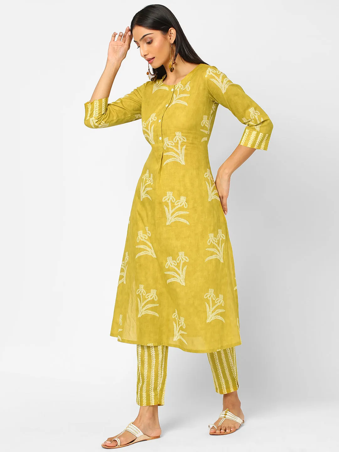 A line cotton printed kurta with placket detailing paired with printed bottom