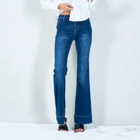 Stylish high-waisted flared jeans with wide hem wholesale