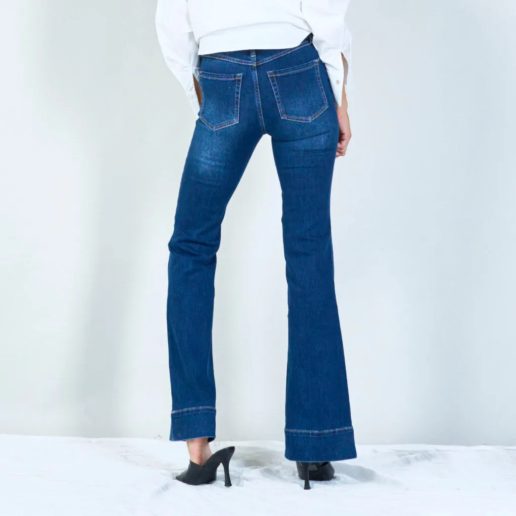 Stylish high-waisted flared jeans with wide hem wholesale